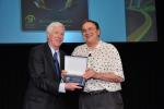 Prof. Smith receives a plaque for his distinguished and high impact contributions to the HCII Conference series
